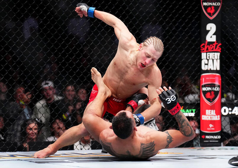 Paddy Pimblett of England punches Tony Ferguson in a lightweight fight during the UFC 296 event at T-Mobile Arena on December 16, 2023 in Las Vegas, Nevada. (Photo by Chris Unger/Zuffa LLC)