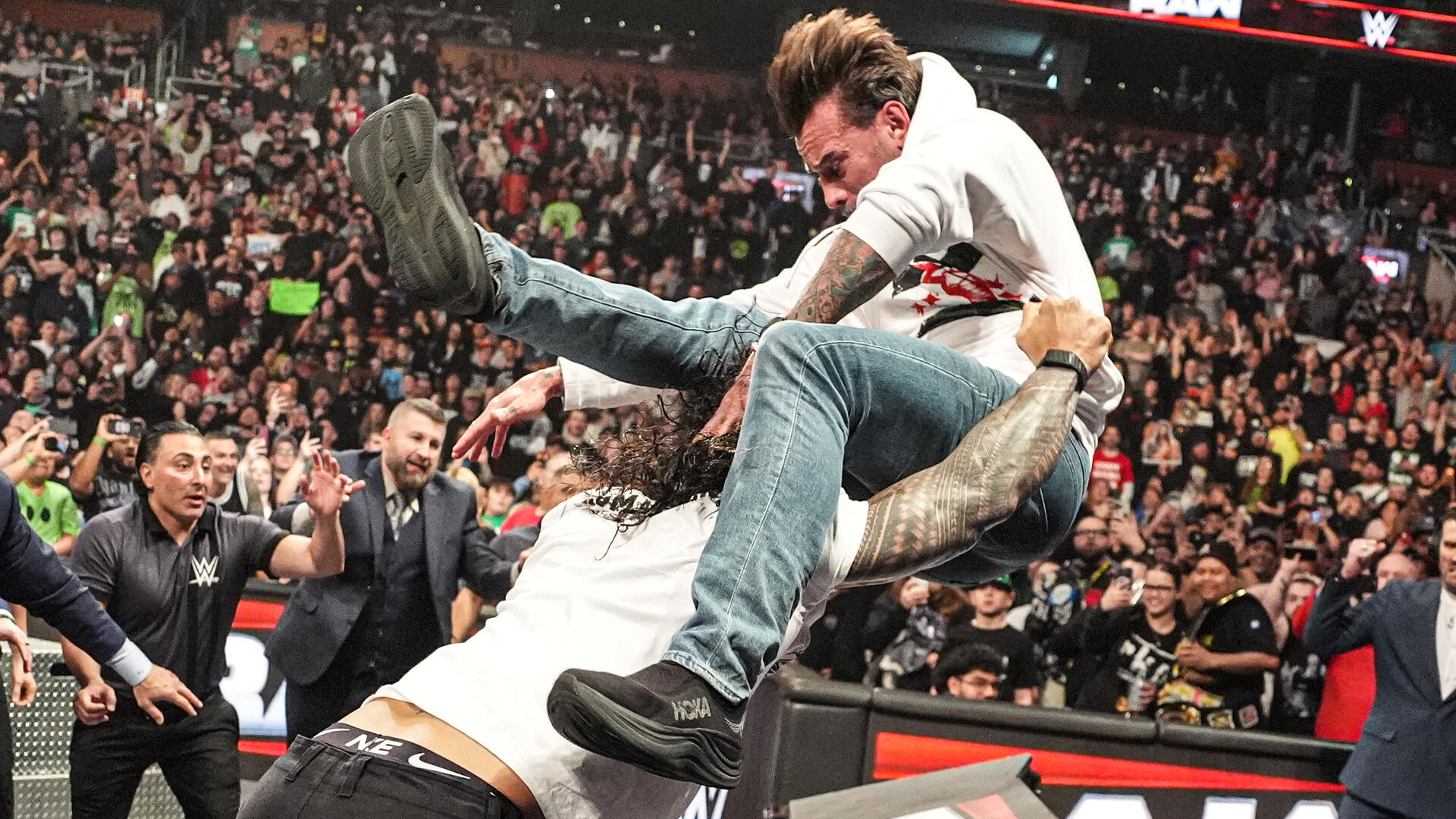 Roman Reigns powerbombs CM Punk