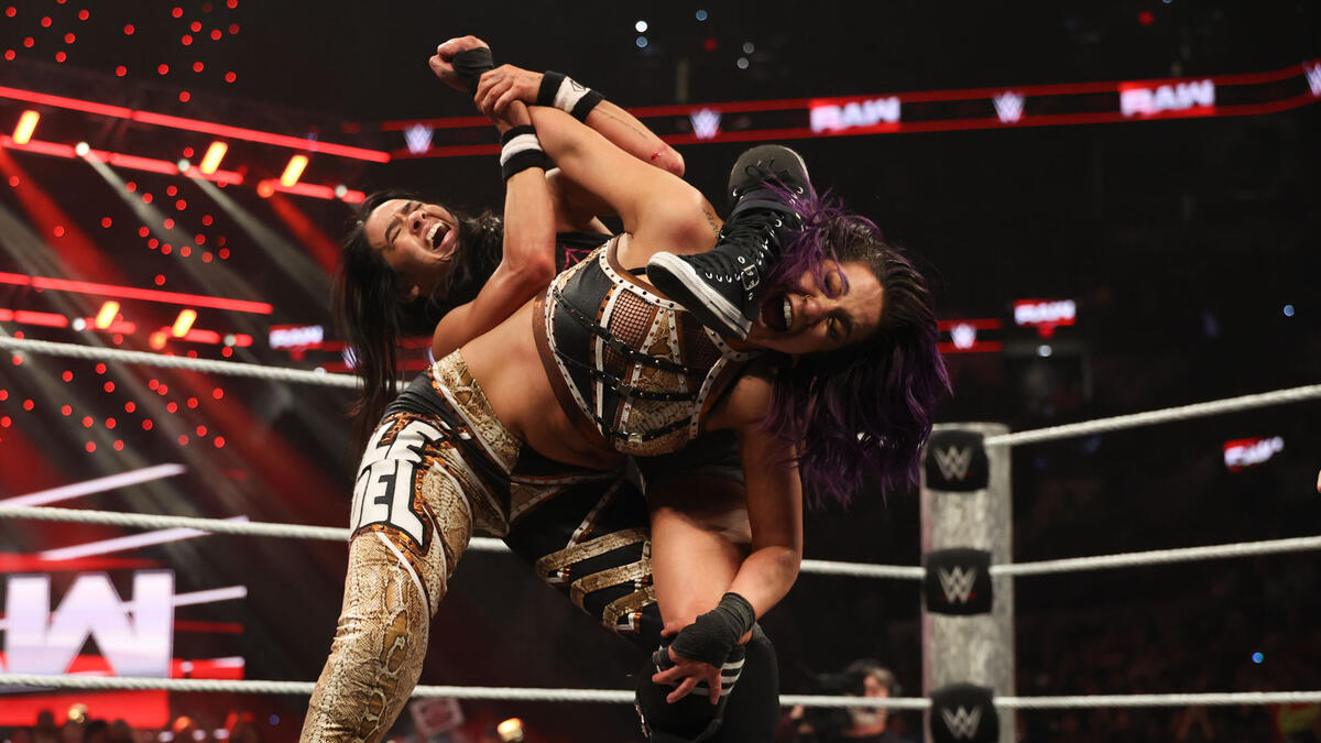 Bayley and AJ Lee do battle