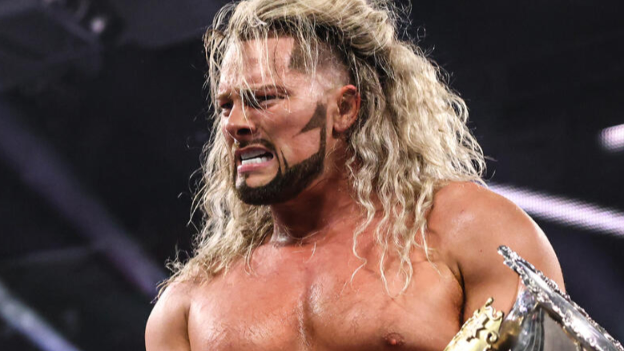 Lexis King with the WWE NXT Heritage Cup