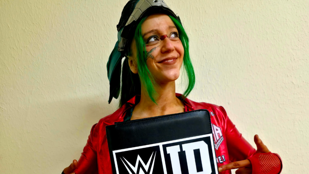 Airica Demia with her WWE ID contract