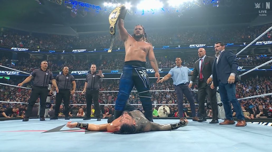 Jacob Fatu stands tall over Roman Reigns