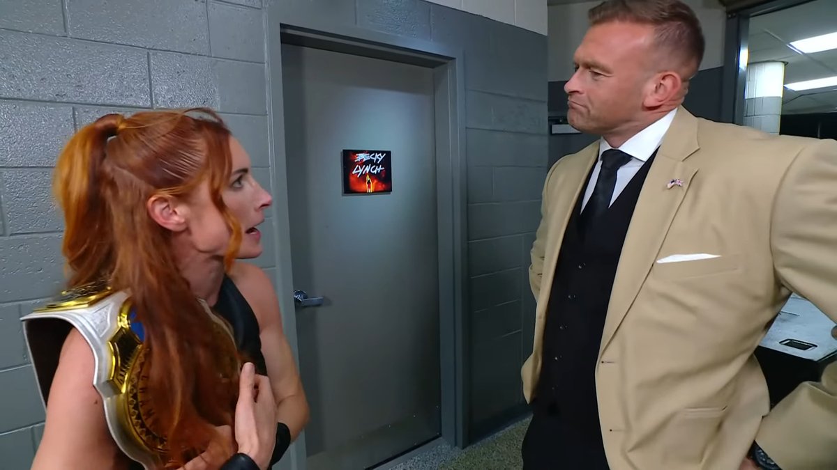 Becky Lynch argues with Nick Aldis