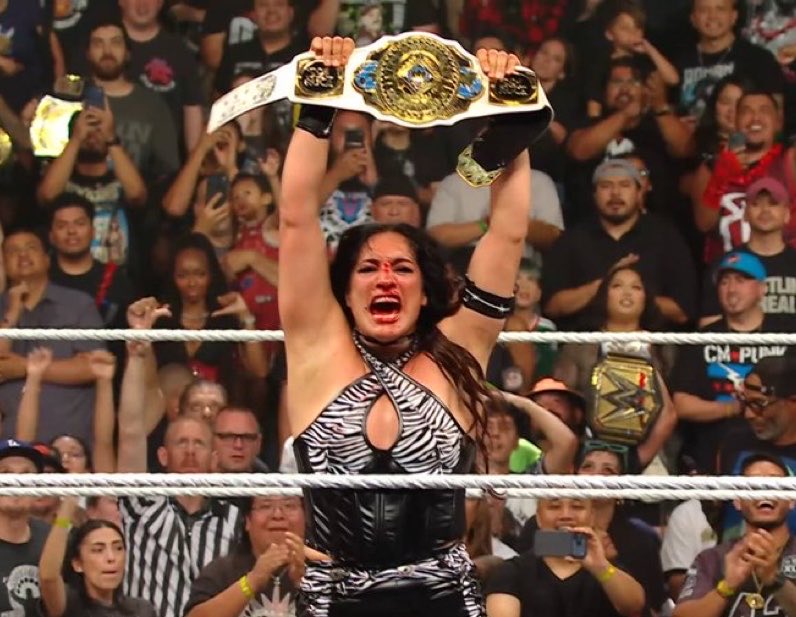 Raquel Rodriguez with WWE Women's Intercontinental Championship